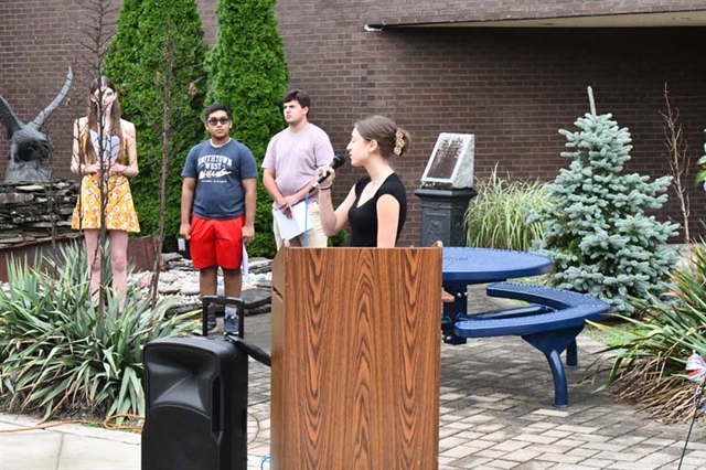 HSW student singing the national anthem