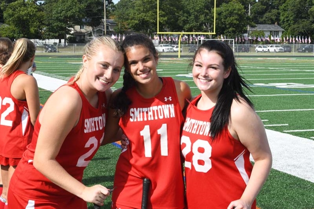field hockey players smiling