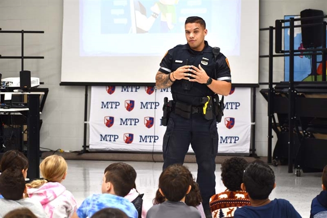 Officer Allison speaking to students