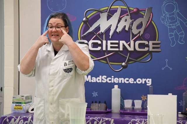 Mad Science instructor with students