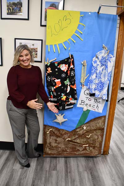 Janine Lavery next to decorated door