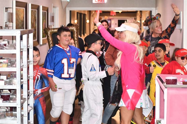 Students visiting St. James Rehabilitation Center on Halloween