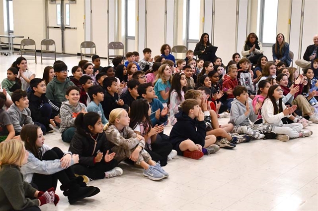 students watching performance