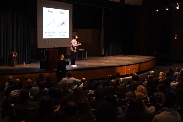 George Courous speaking