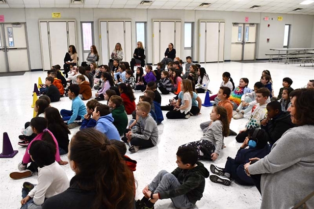 students watching performance