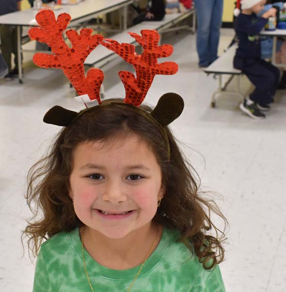 Student in holiday hat