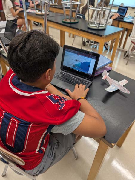 Students conducting PLTW activities
