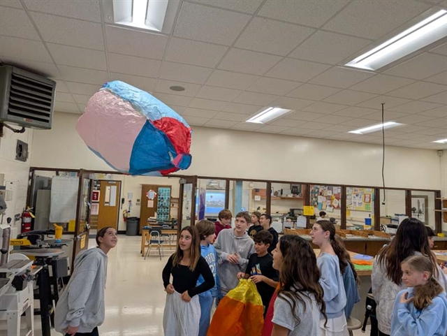 Students conducting PLTW activities