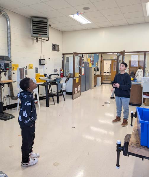 students doing science project