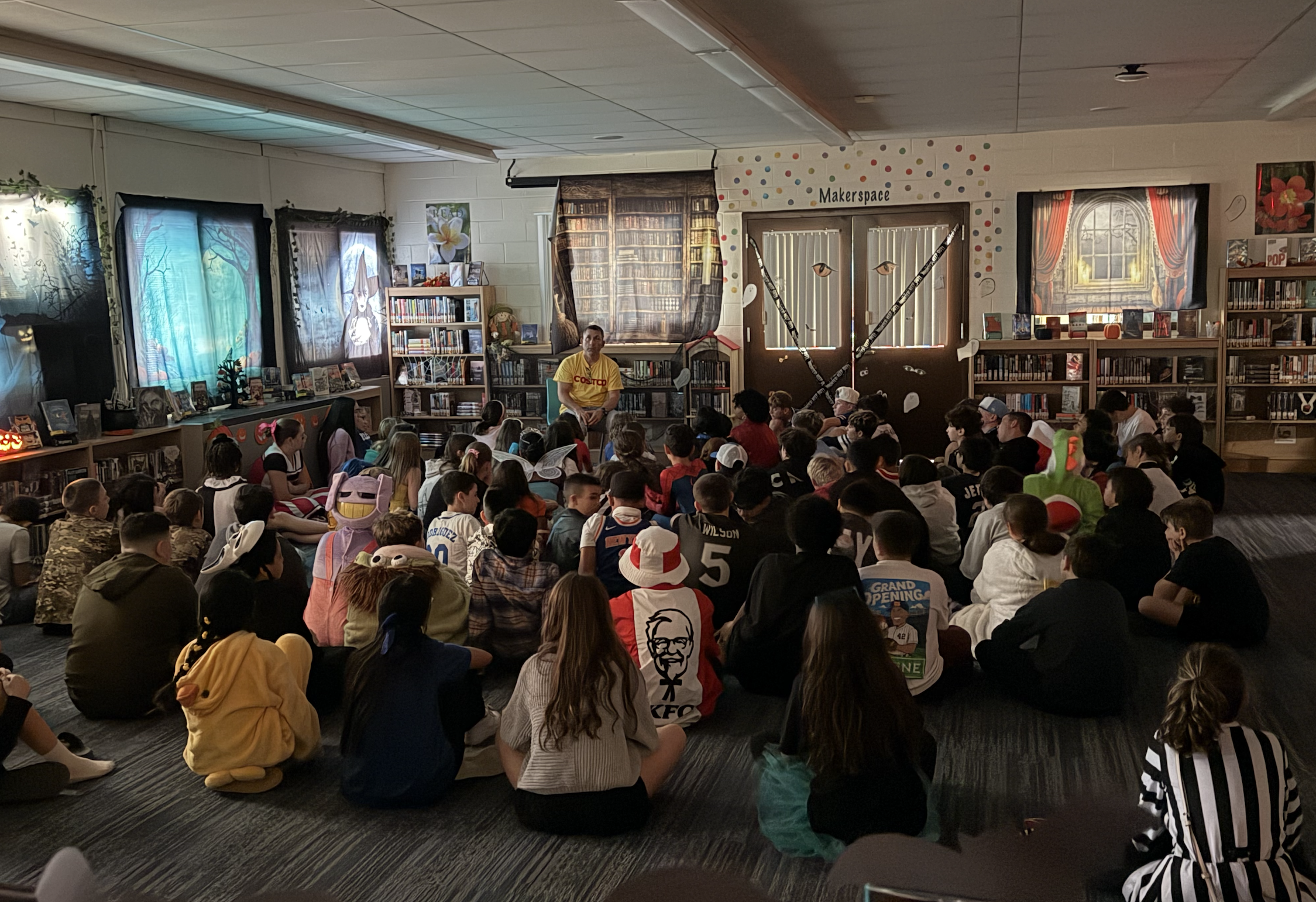 Teacher telling a halloween story