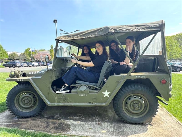 students in army truck