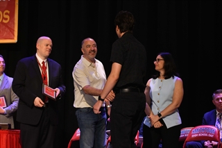 Board members shaking hands