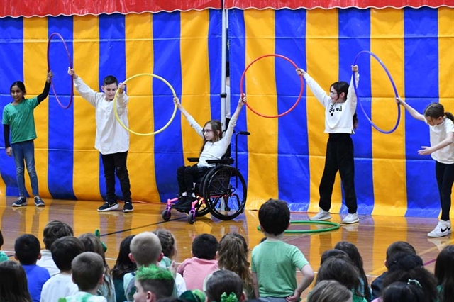 students performing circus acts