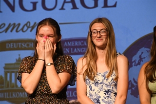 two students on stage
