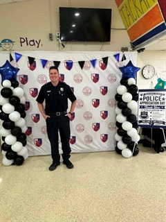 Officer posing for picture