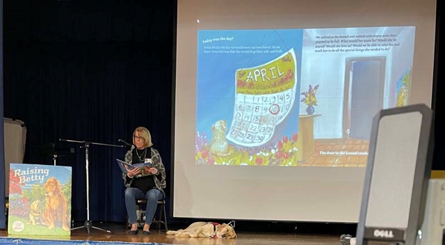 Sarah Zagaja reading to audience