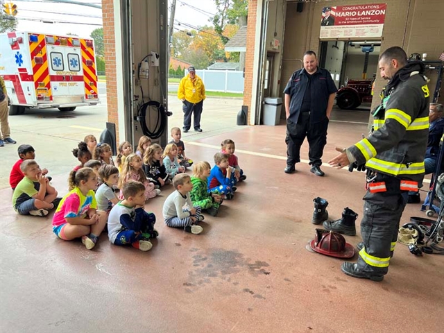 Kindergarten students at fire house