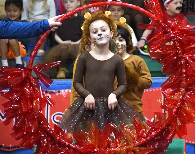 student dressed as a lion