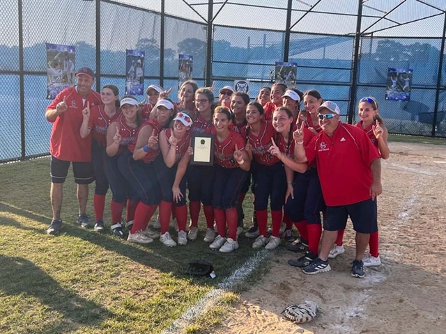 softball team holding trophy