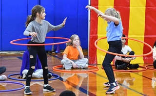 Student with hula hoops