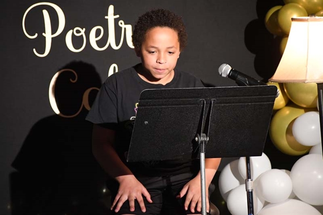 student reading poetry