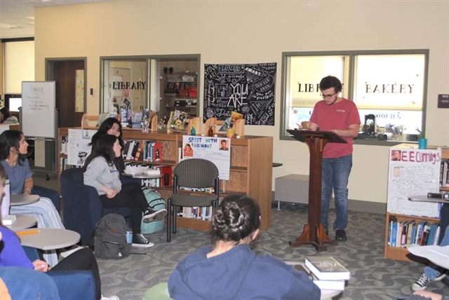 Students in a group reciting poetry