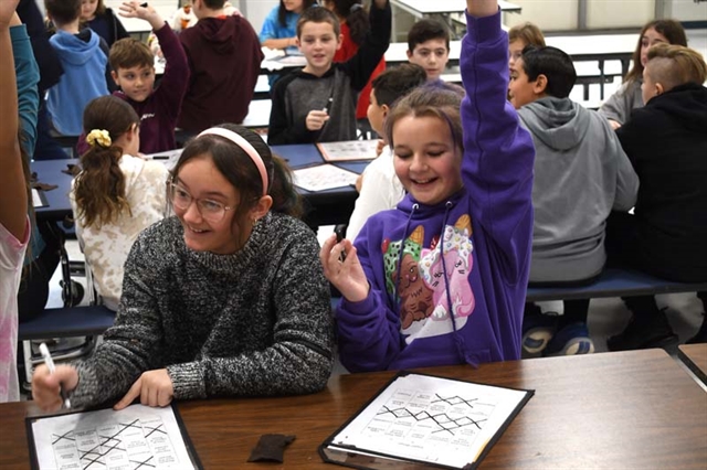 students playing bingo