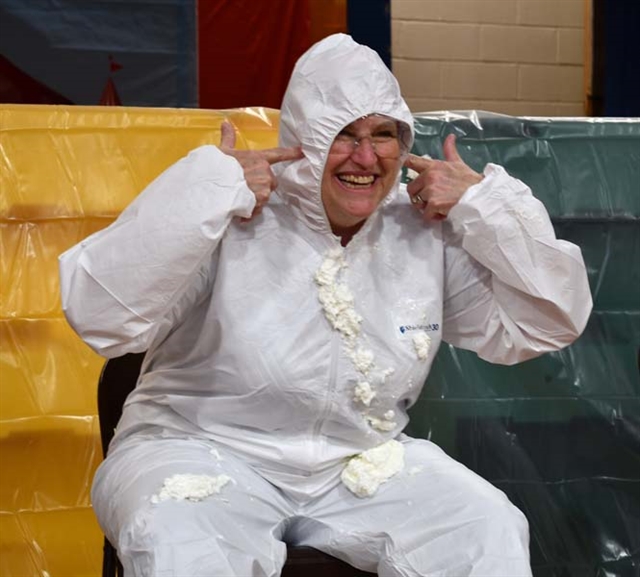 Principal Westrack getting a pie to the face