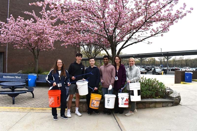 students and staff posing for a picture