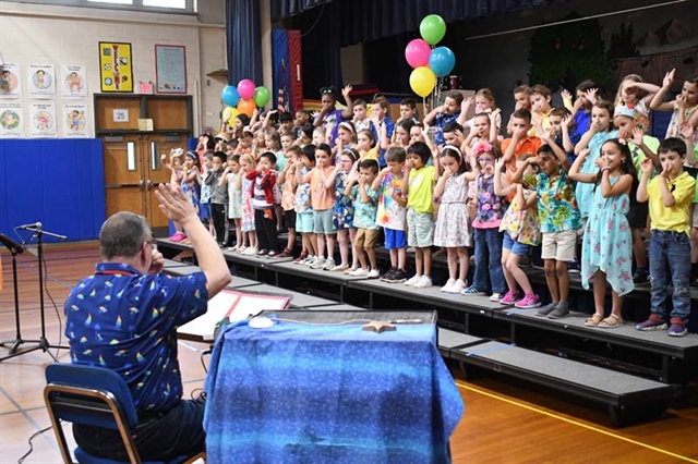 students singing