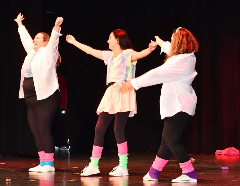 Teachers dancing on stage