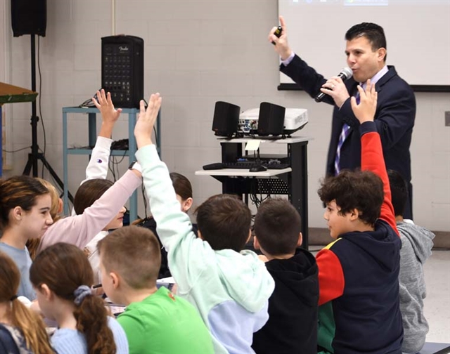 Principal Ierano with students