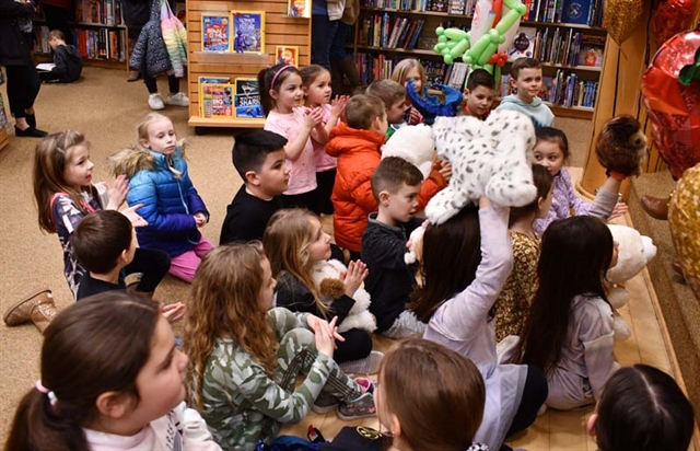 students listening to book reading