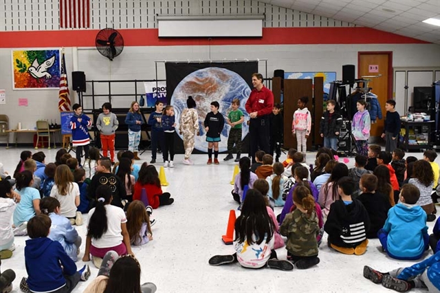 students watching performance