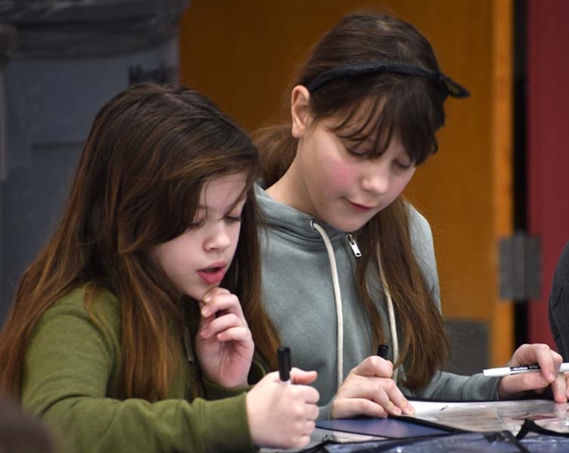 students playing bingo