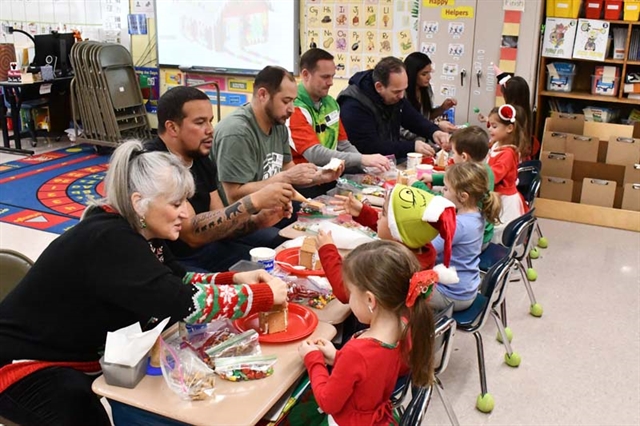 Parents and students making houses