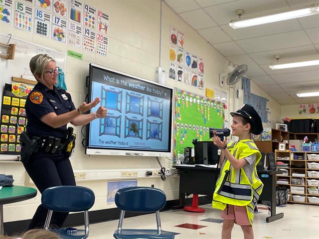 child and aunt in classroom